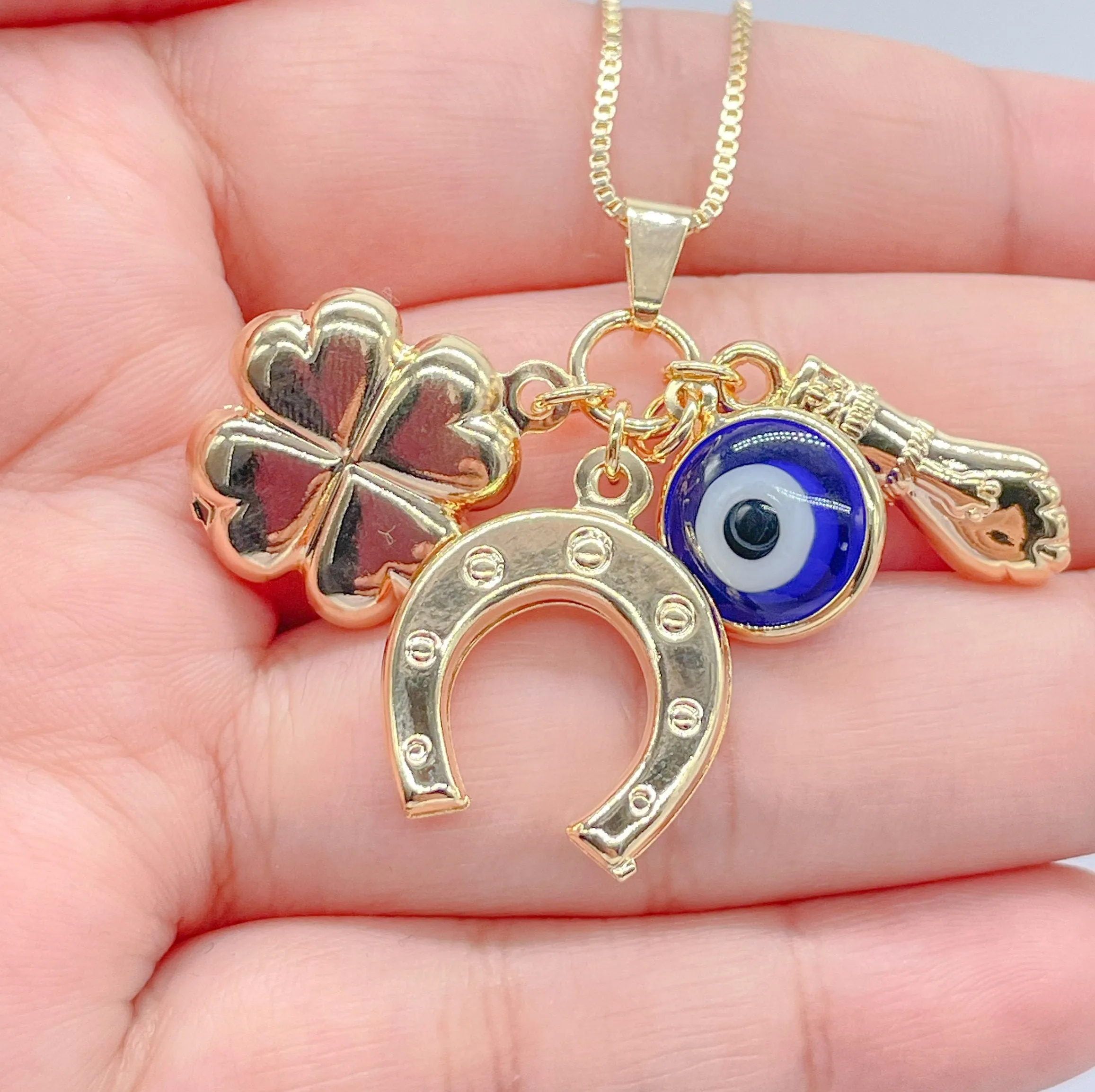 18k Gold Filled Gold Figa Hand With Four Leaf Clover, Horse Shoe And Evil Eye Charm