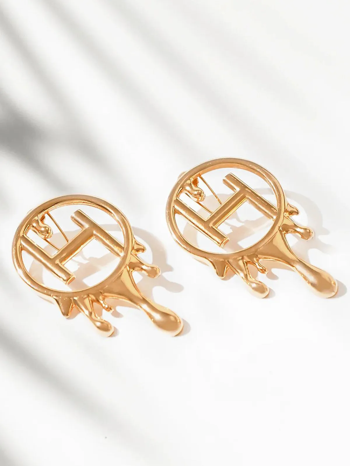 Alaya F in Midi Mongram Earrings