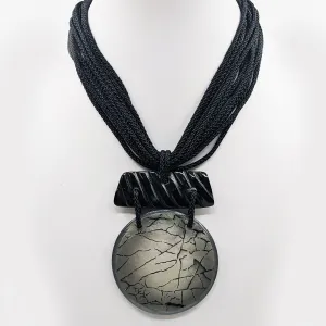 Luxury Statement necklace with resin disc & horn components on multi cord