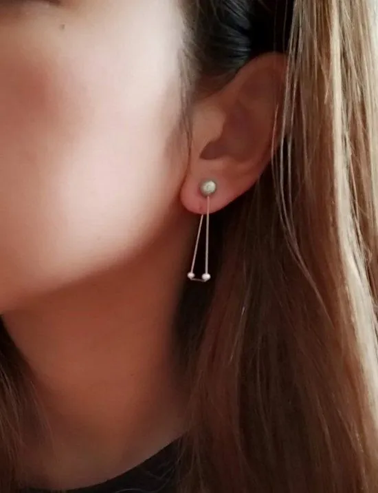 Reversible ear clip Rhythm