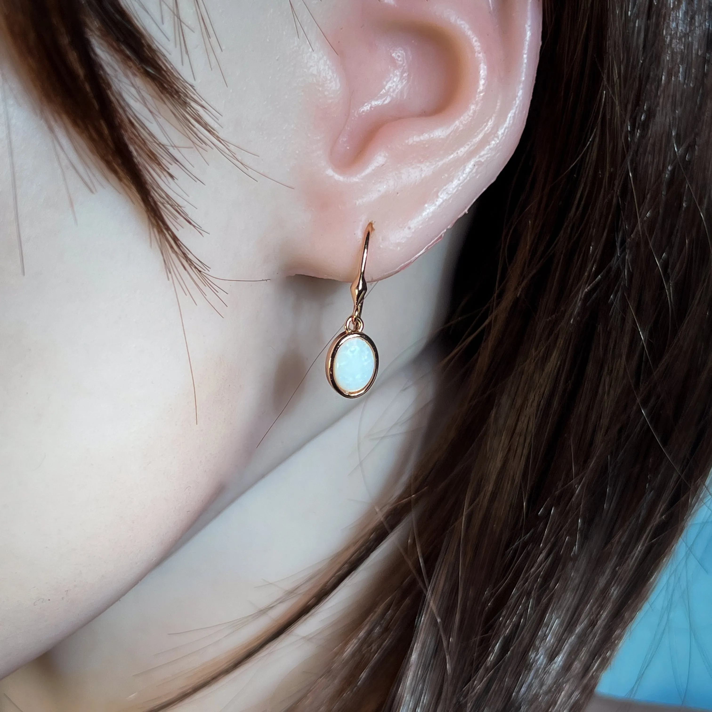 Rose Gold plated Silver danglng bezel set White Opals on hooks