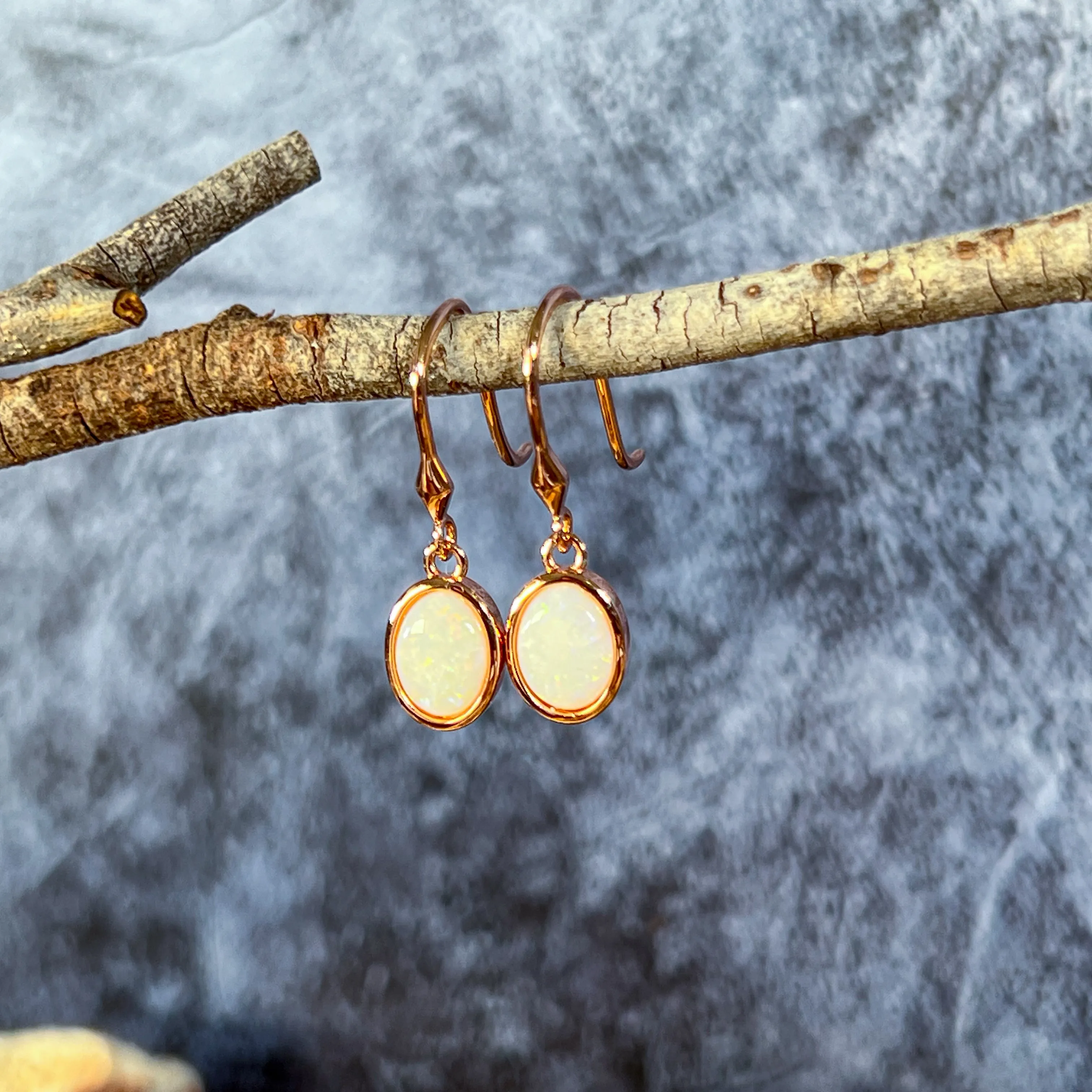 Rose Gold plated Silver danglng bezel set White Opals on hooks