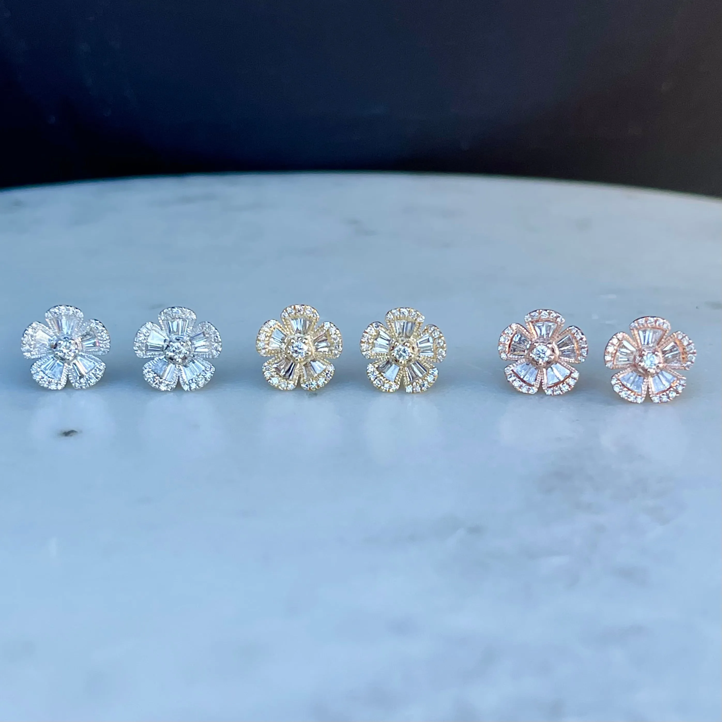 WD902 14kt gold .40ct Baguette flower studs